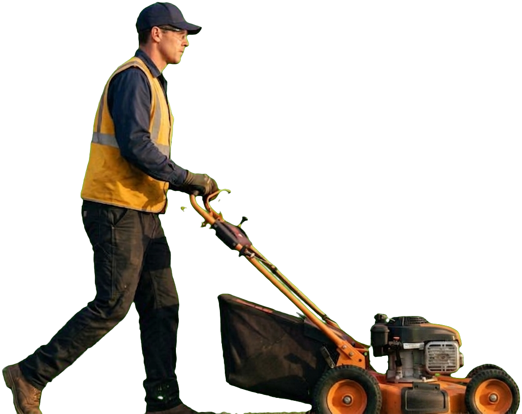 Jays Landscaping crew member pushing a mower